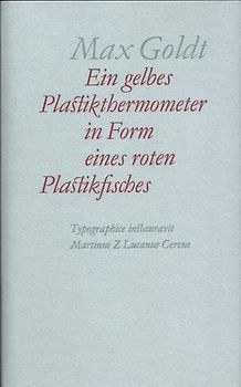 Ein gelbes Plastikthermometer in Form eines roten Plastikfisches. Typographisch angeordnet