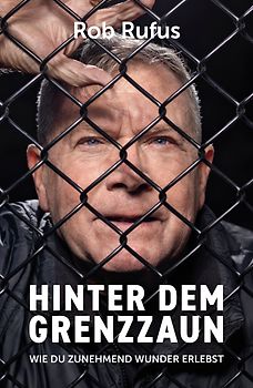 Hinter dem Grenzzaun