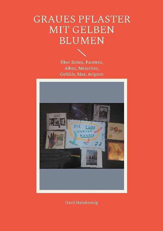 Graues Pflaster mit gelben Blumen